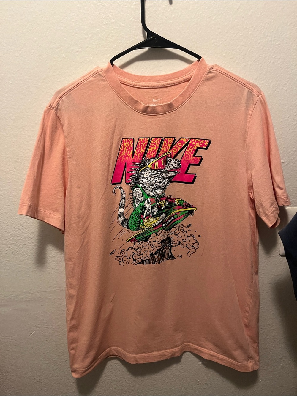 Nike Peach Short-Sleeve Graphic Tee with Surfing Lizard